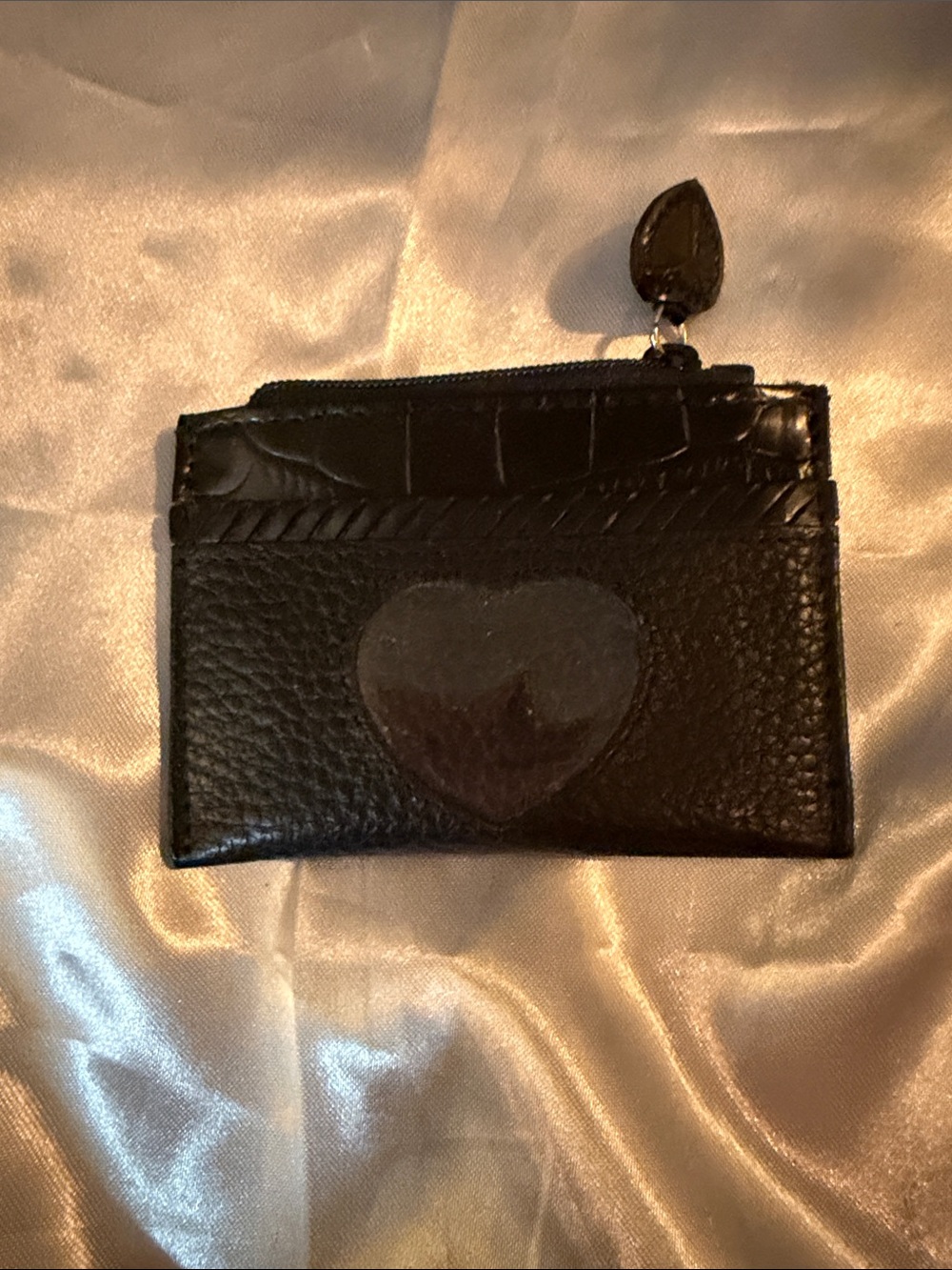 Black Leather Heart Card Wallet with Top Zip by Brighton.